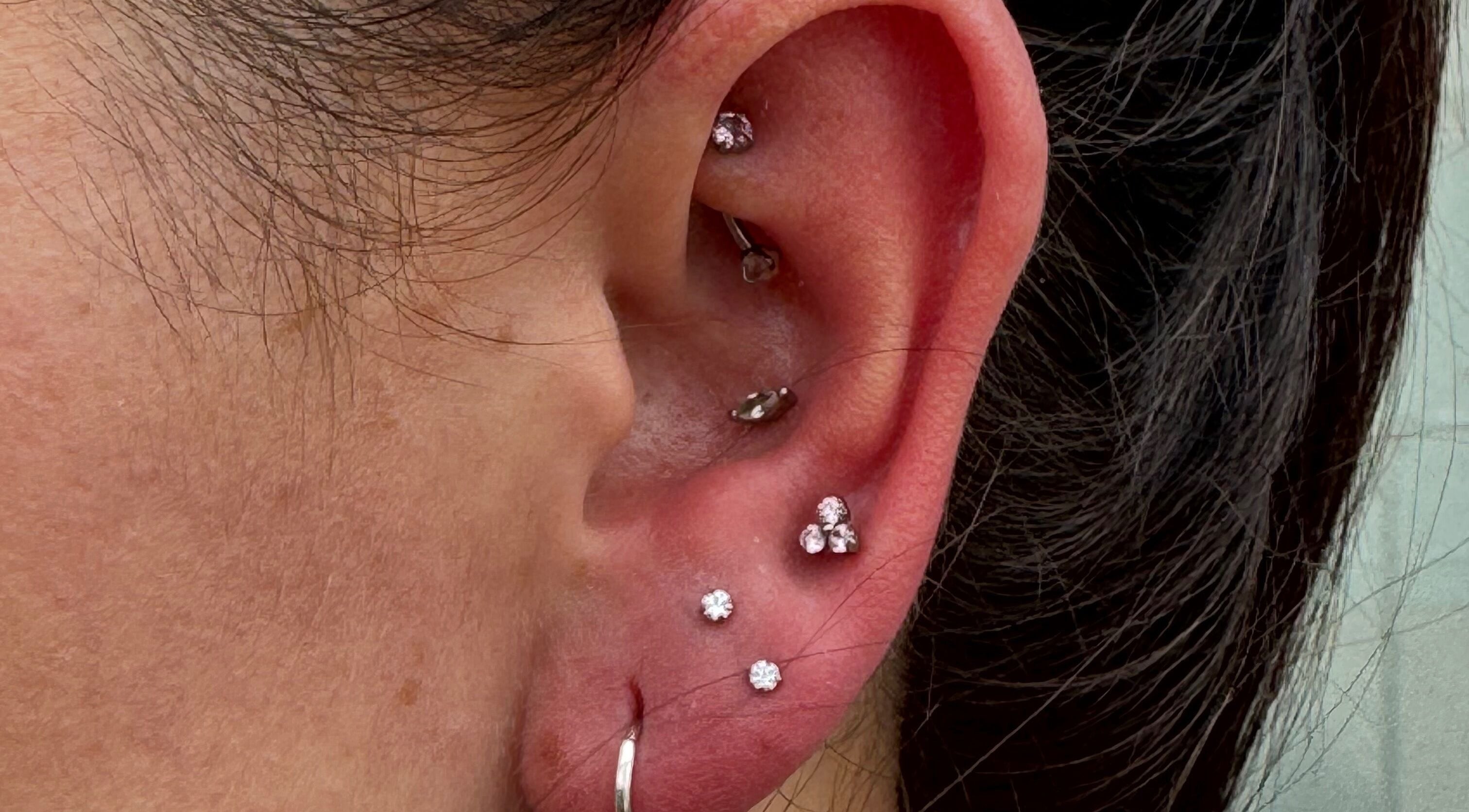 Intricate ear piercings with gemstones by Pretty Piercings by Sheree, Crosshill, Scotland, GB.