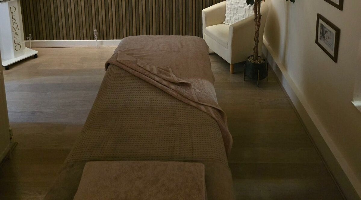 Tranquil massage room at AK Laser Beauty & Brows, Accrington, England, GB, featuring a cozy massage bed.