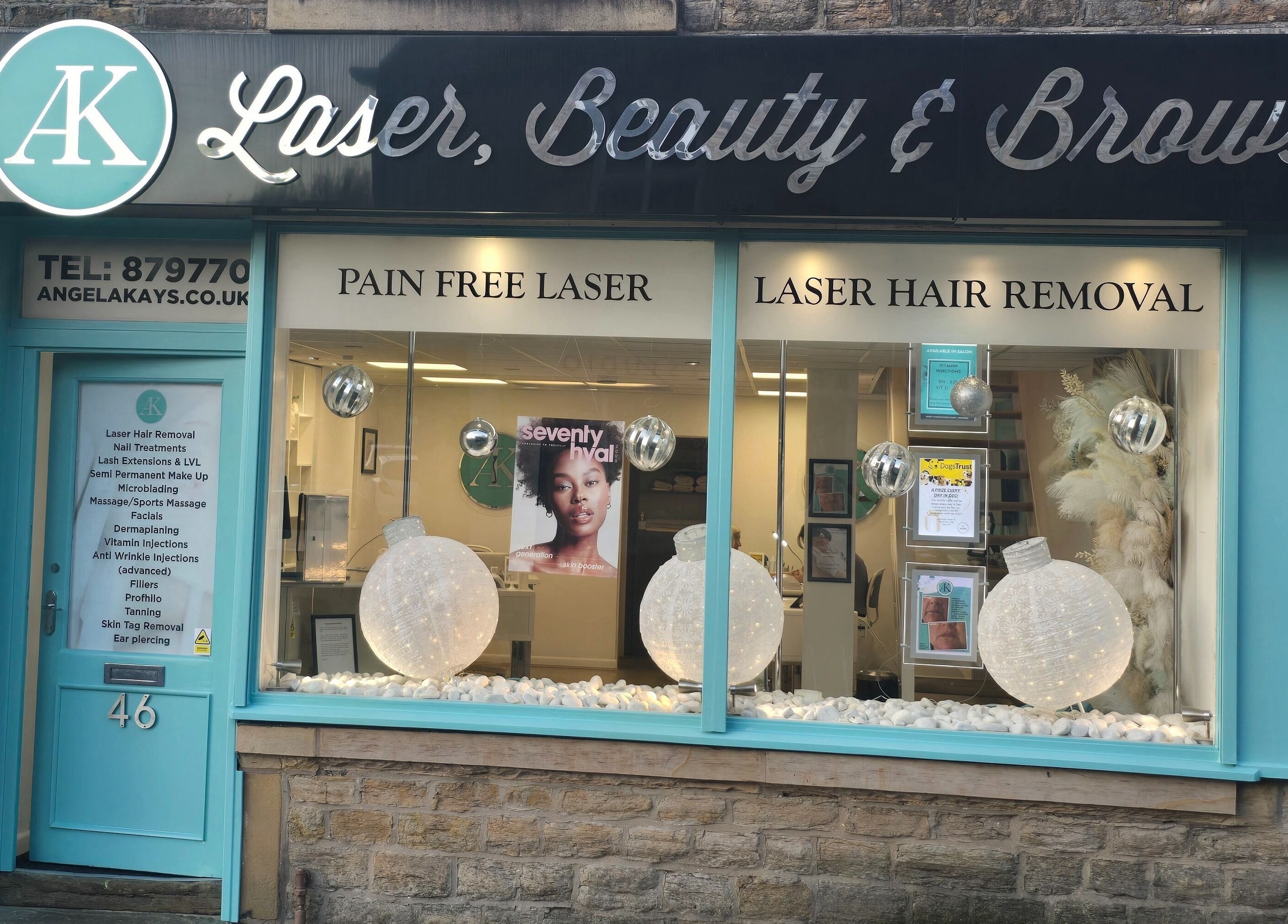 The storefront of AK Laser Beauty & Brows in Accrington, England, GB with elegant windows, signage, and decor.