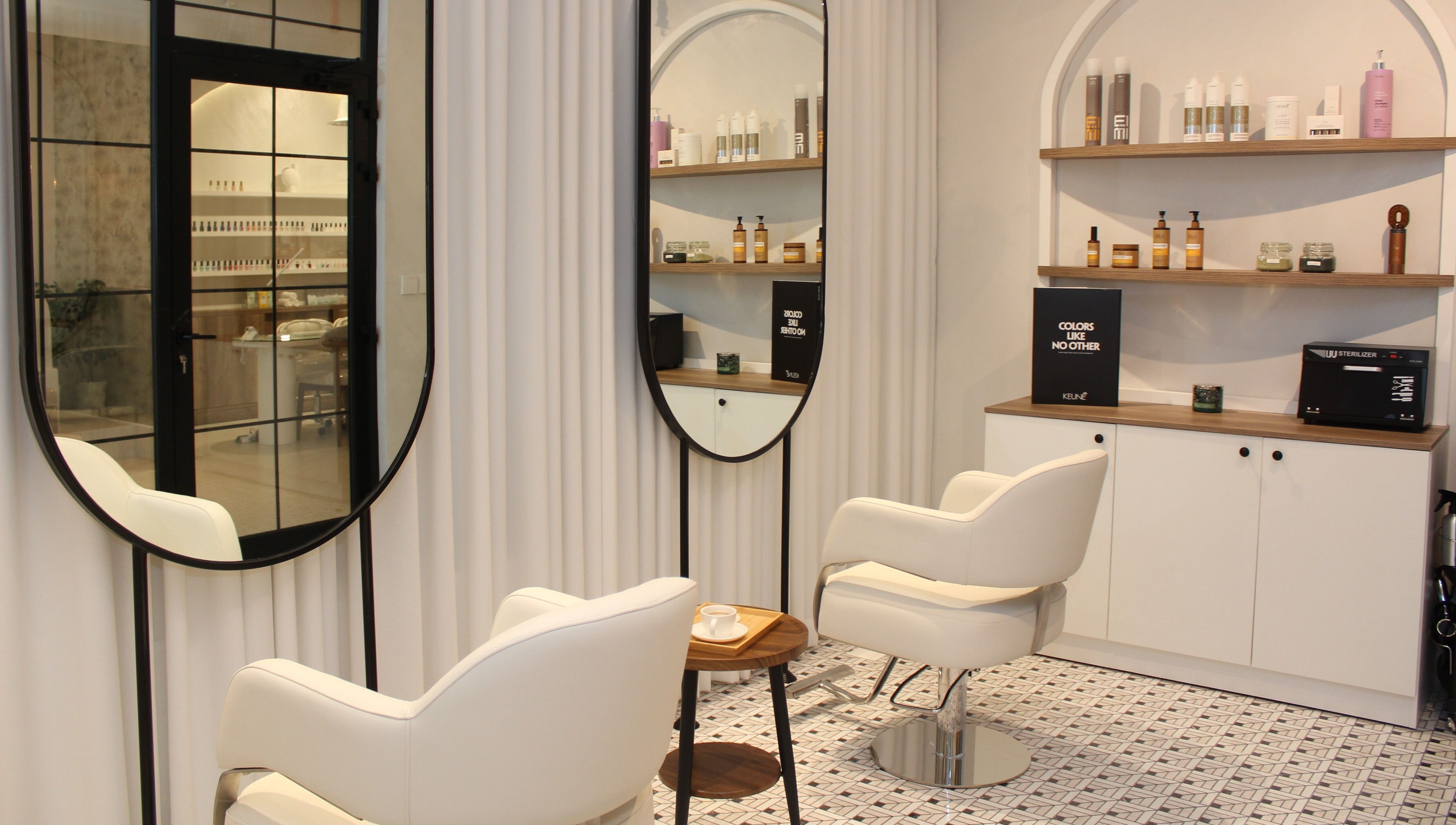 Elegant salon interior at Hayat and Spa, الخبر, المنطقة الشرقية, SA. Features stylish chairs and beauty products.