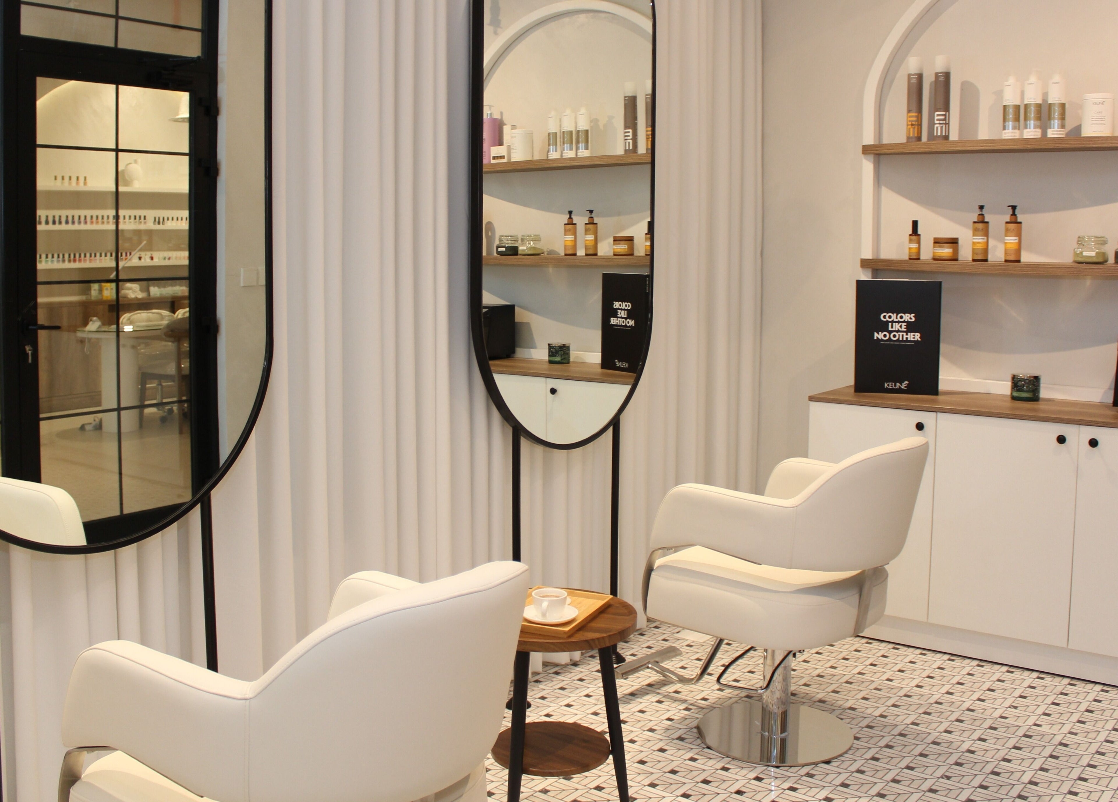 Elegant salon interior at Hayat and Spa, الخبر, المنطقة الشرقية, SA. Features stylish chairs and beauty products.