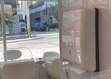 Interior ambience of Champagne Nail Lounge on Drake in Vancouver, BC showcasing serene street view.