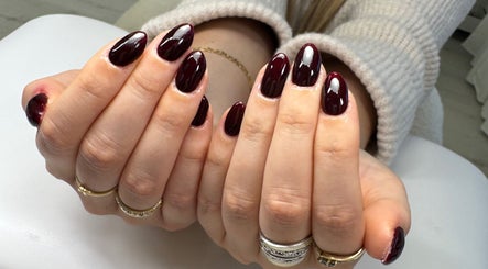 Elegant burgundy gel nails manicure from All Things Beauty, Flitwick, England, GB.