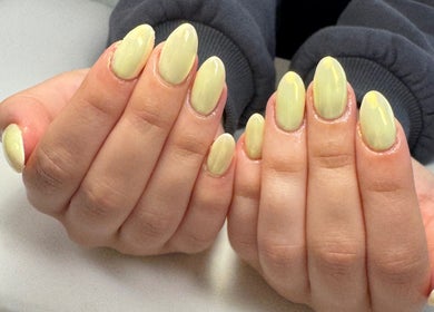 Chic lemon yellow manicure at All Things Beauty, Flitwick, England, GB.