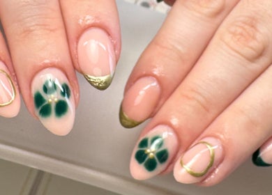 Stylish nail art with floral designs at All Things Beauty in Flitwick, England, GB.