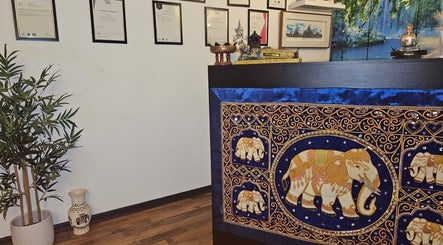 Reception area with ornate elephant tapestry at Blue Sky Thai Massage Ltd, Belfast, Northern Ireland, GB.