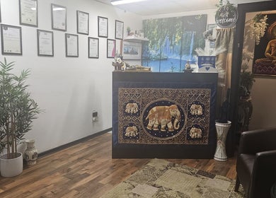 Blue Sky Thai Massage Ltd's serene reception with Thai decor in Belfast, Northern Ireland, GB.