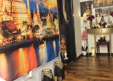 Interior of Blue Sky Thai Massage Ltd in Belfast, Northern Ireland, GB with Thai decor and warm lighting.