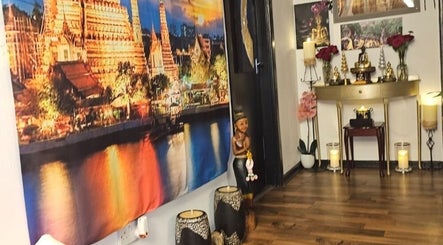 Interior of Blue Sky Thai Massage Ltd in Belfast, Northern Ireland, GB with Thai decor and warm lighting.