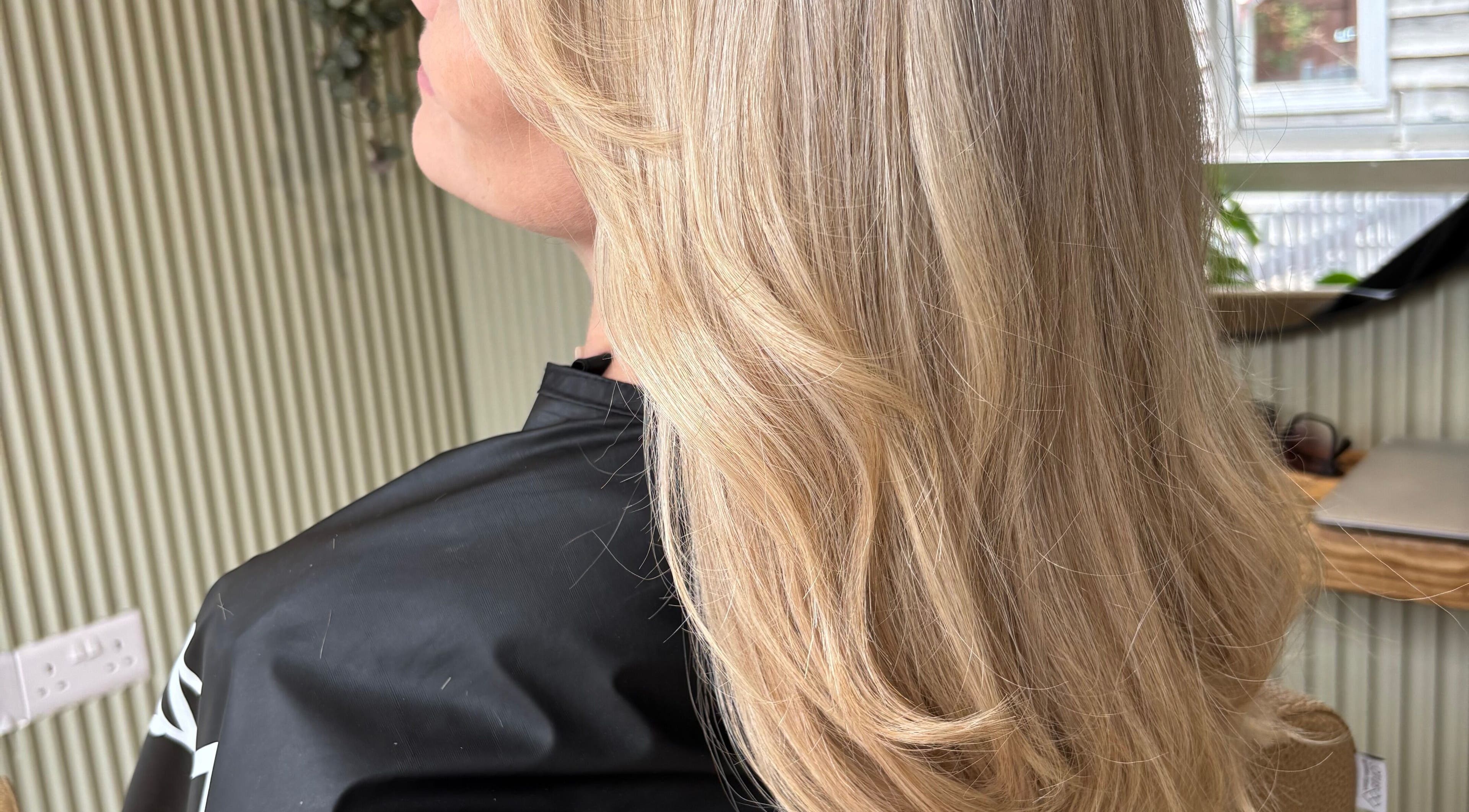 Stylish blonde hairstyle at Hannah Marie Hair Studio, Hurstbourne Tarrant, England, GB.