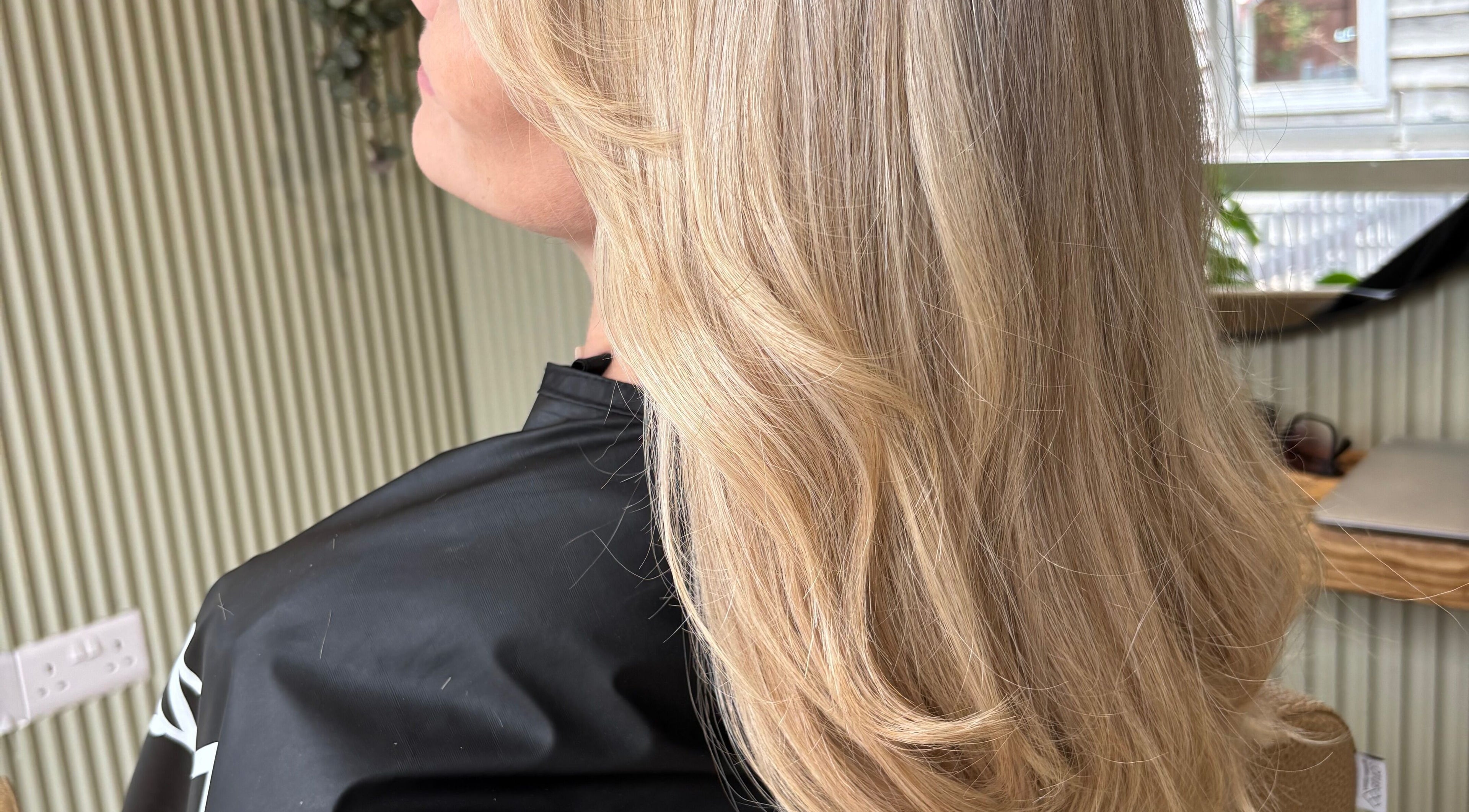 Stylish blonde hairstyle at Hannah Marie Hair Studio, Hurstbourne Tarrant, England, GB.