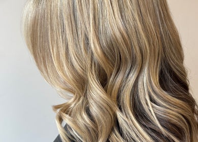 Stylish blonde waves at Hannah Marie Hair Studio, Hurstbourne Tarrant, England, GB.