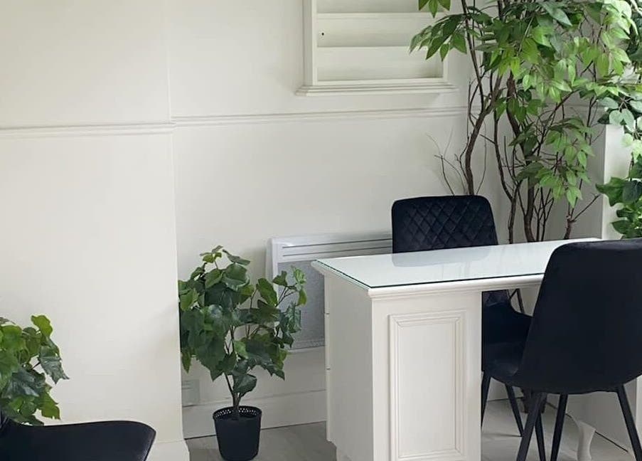 Elegant consultation area with greenery at The Quartz Clinic, Hucknall, England, GB.