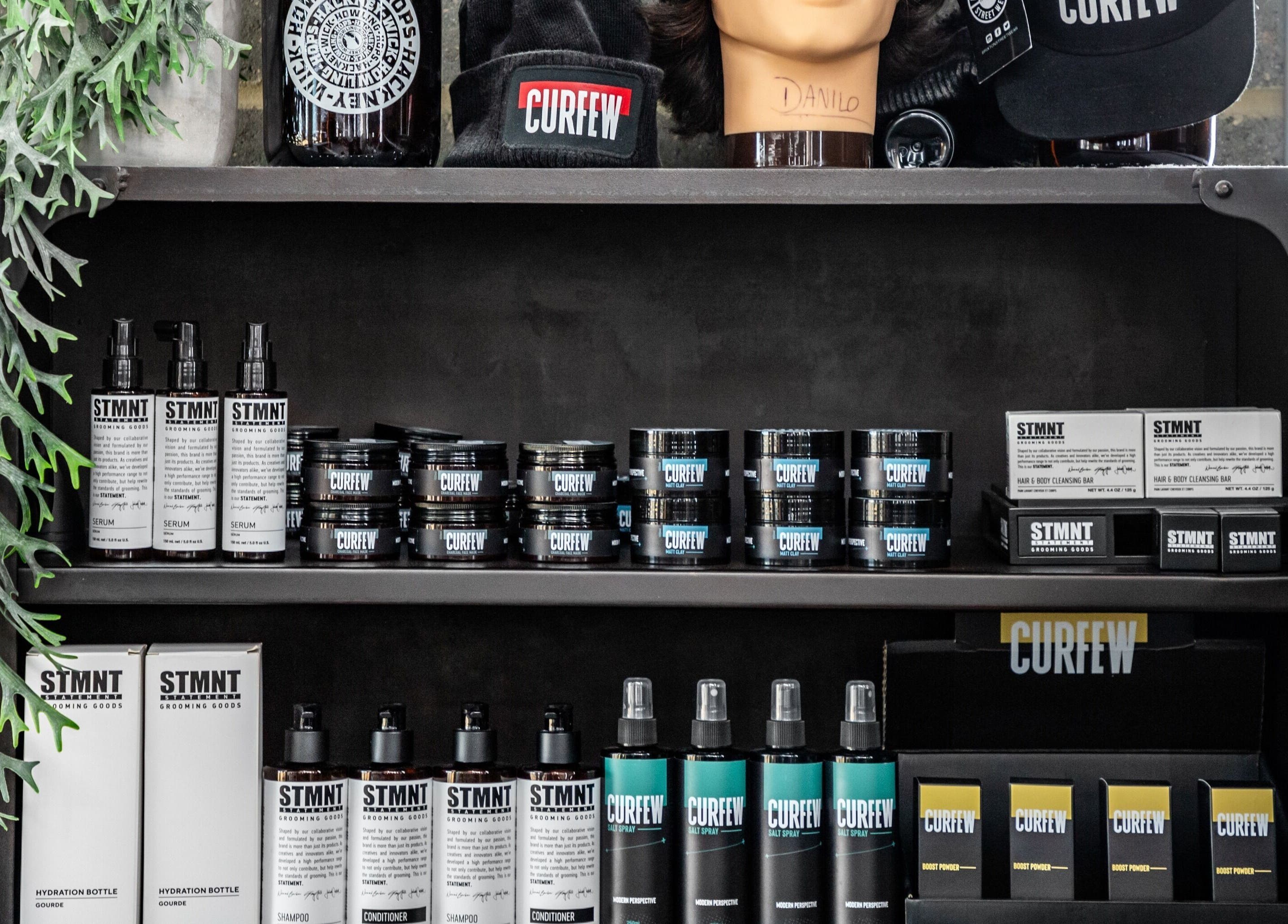 Curfew Grooming Hackney Wick product display with signature hair products, London, England, GB.