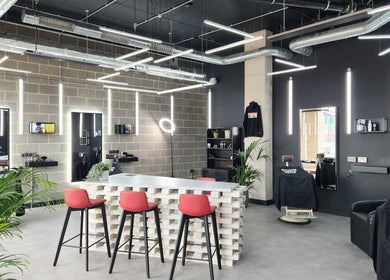 Interior of Curfew Grooming Wandsworth in London, England, GB with stylish decor and bright lighting.