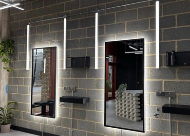 Chic salon interior at Curfew Grooming Wandsworth, London, England, GB, featuring contemporary decor and ambience.
