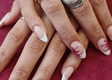 Beautiful nail art with French tips at Ks Nail Salon in London, England, GB. Expert manicure services available.