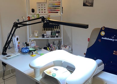Nailchemy/ra nail station in Seri Kembangan, Selangor, MY. Features tools and decor for a relaxing manicure experience.