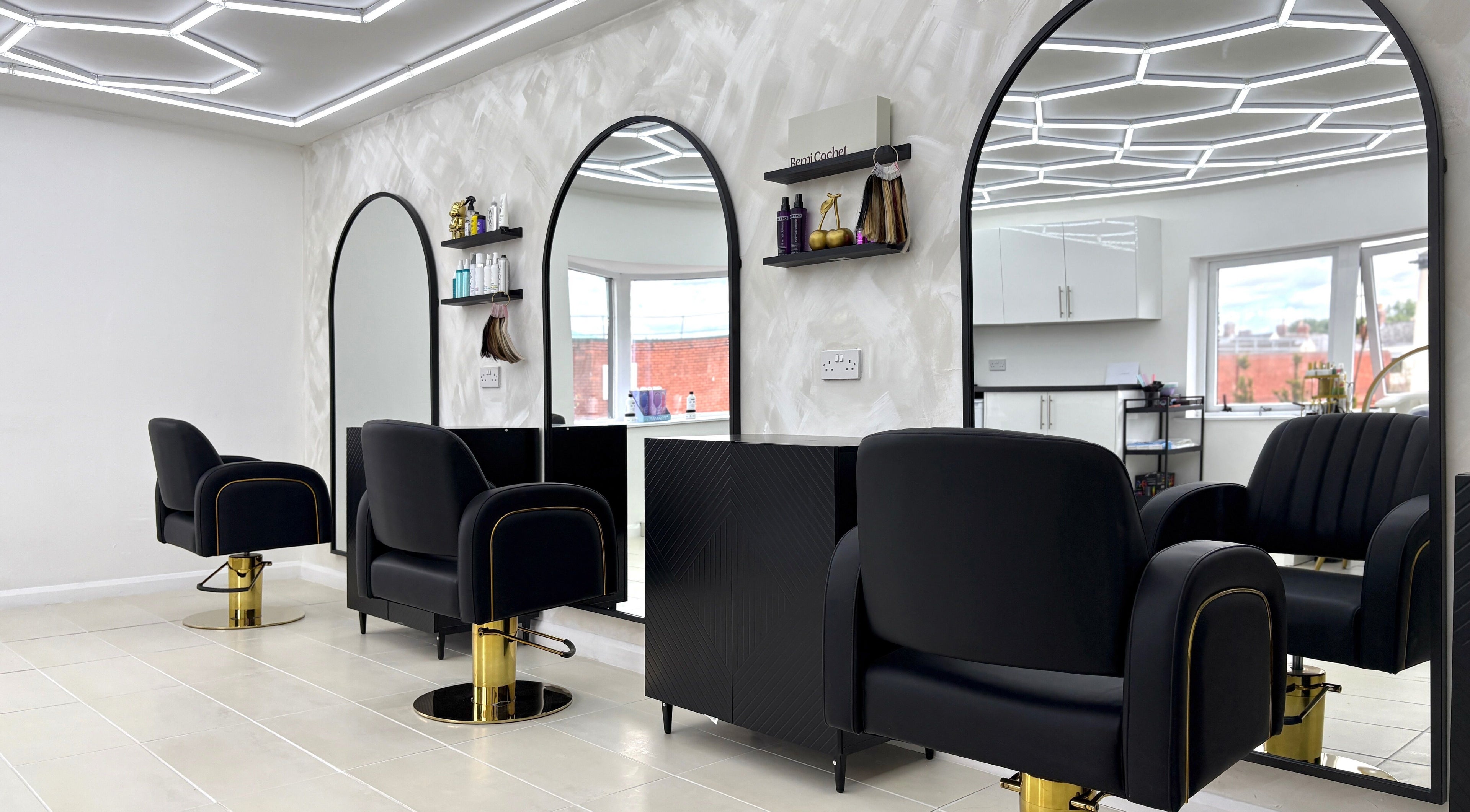 Elegant seating at Ashleigh Jade Hairdressing, Blyth, England. Modern style and comfort in a serene salon setting.