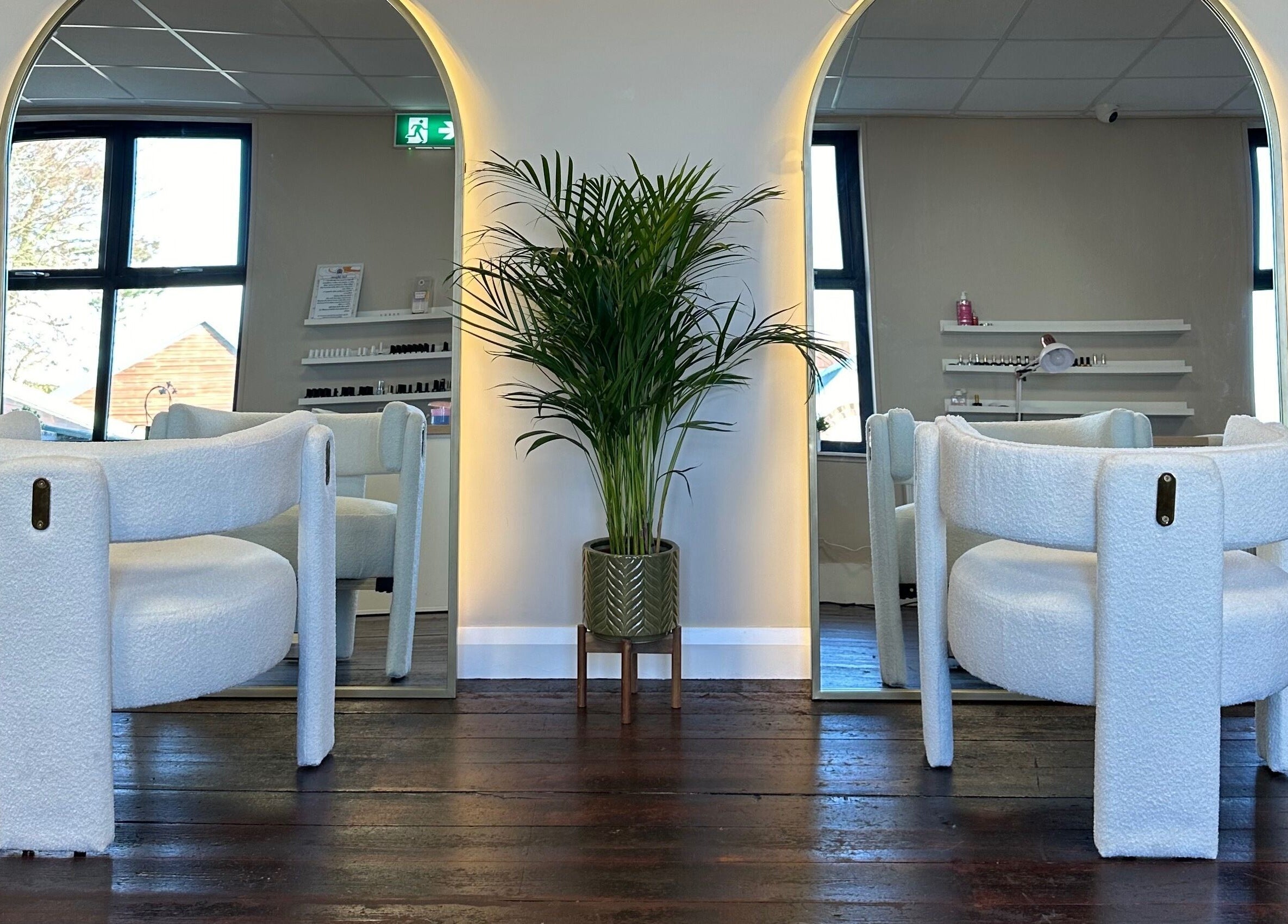 Stylish salon chairs and mirrors at Loft Health & Beauty, Broughshane, Northern Ireland, GB.