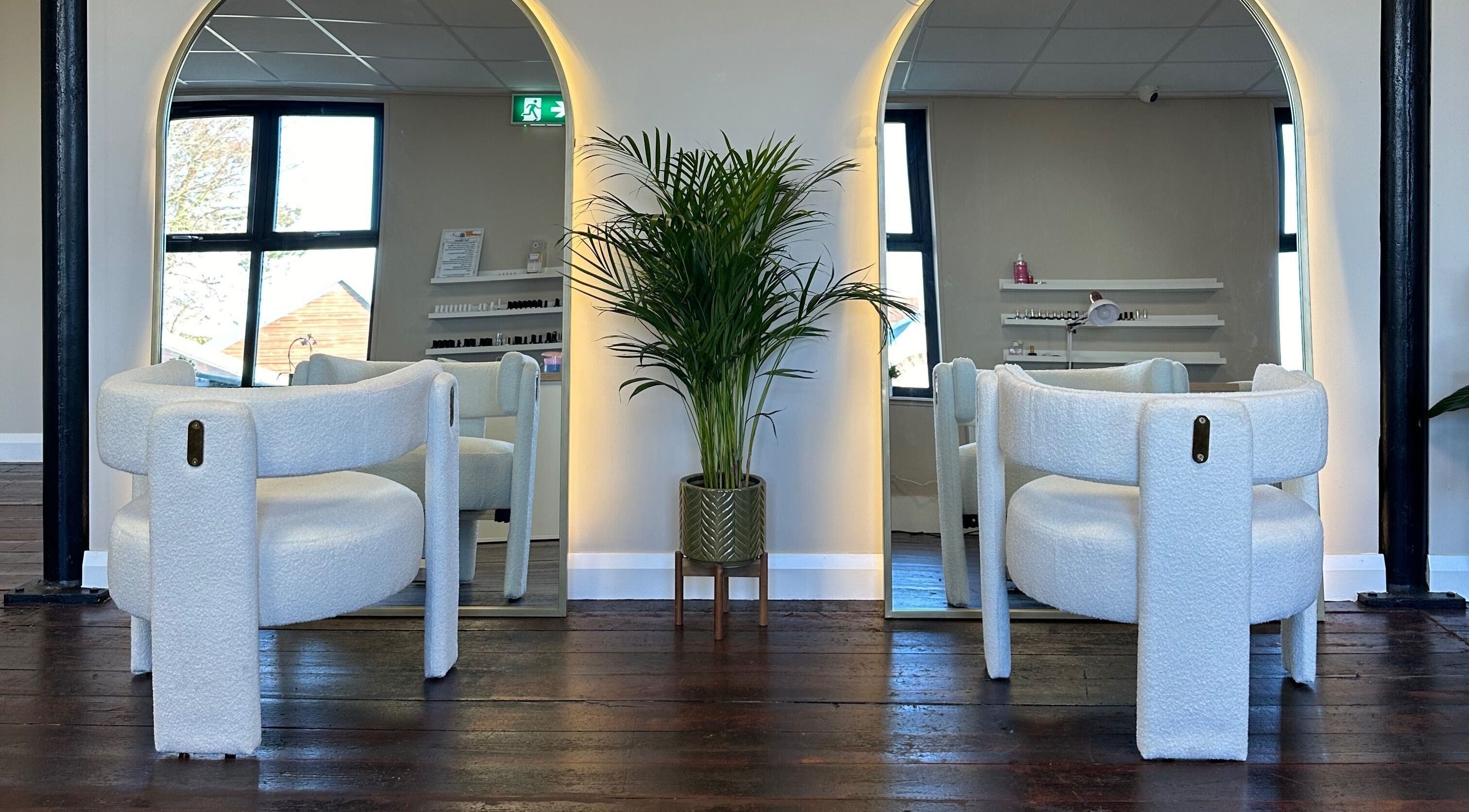 Stylish salon chairs and mirrors at Loft Health & Beauty, Broughshane, Northern Ireland, GB.