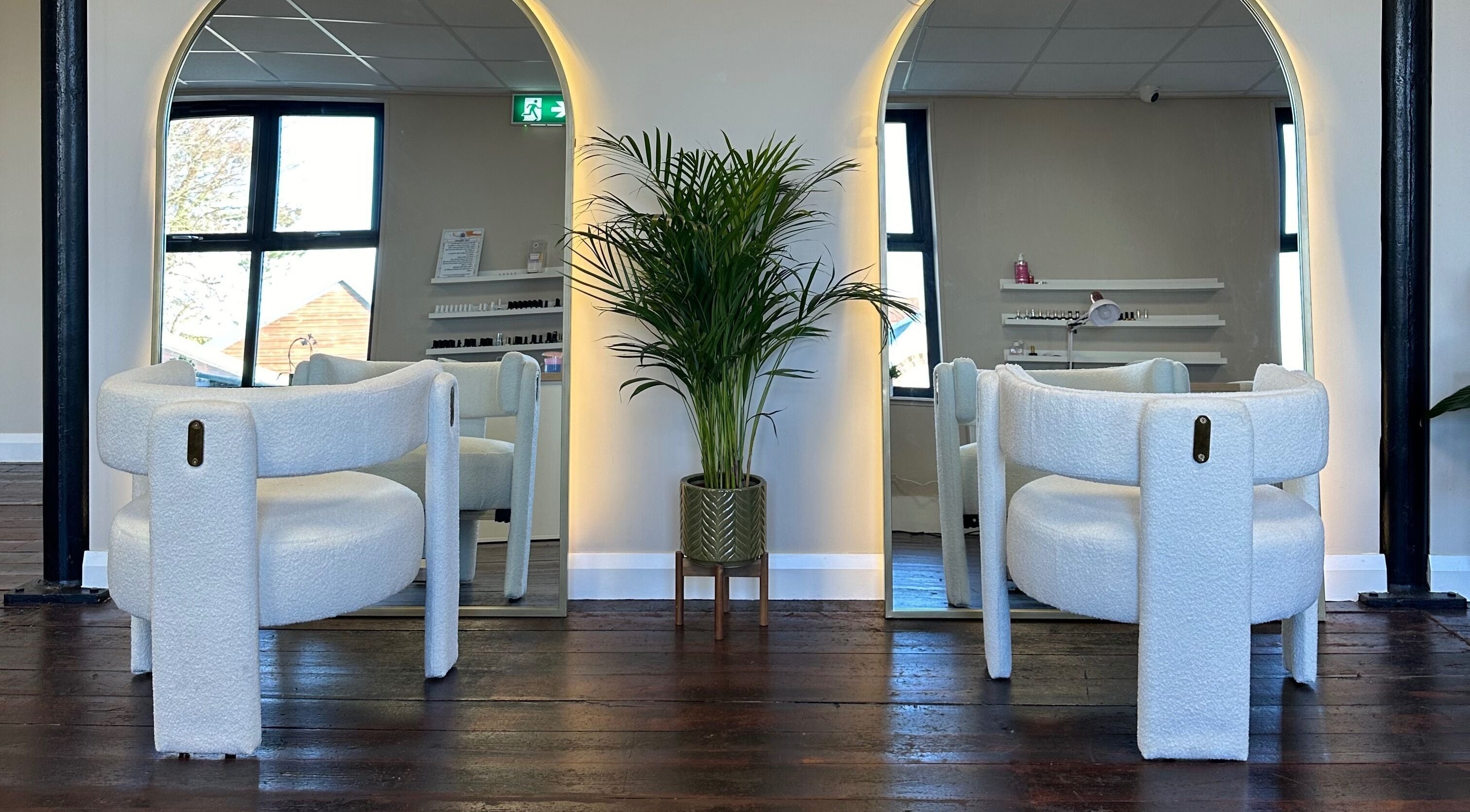 Stylish salon chairs and mirrors at Loft Health & Beauty, Broughshane, Northern Ireland, GB.