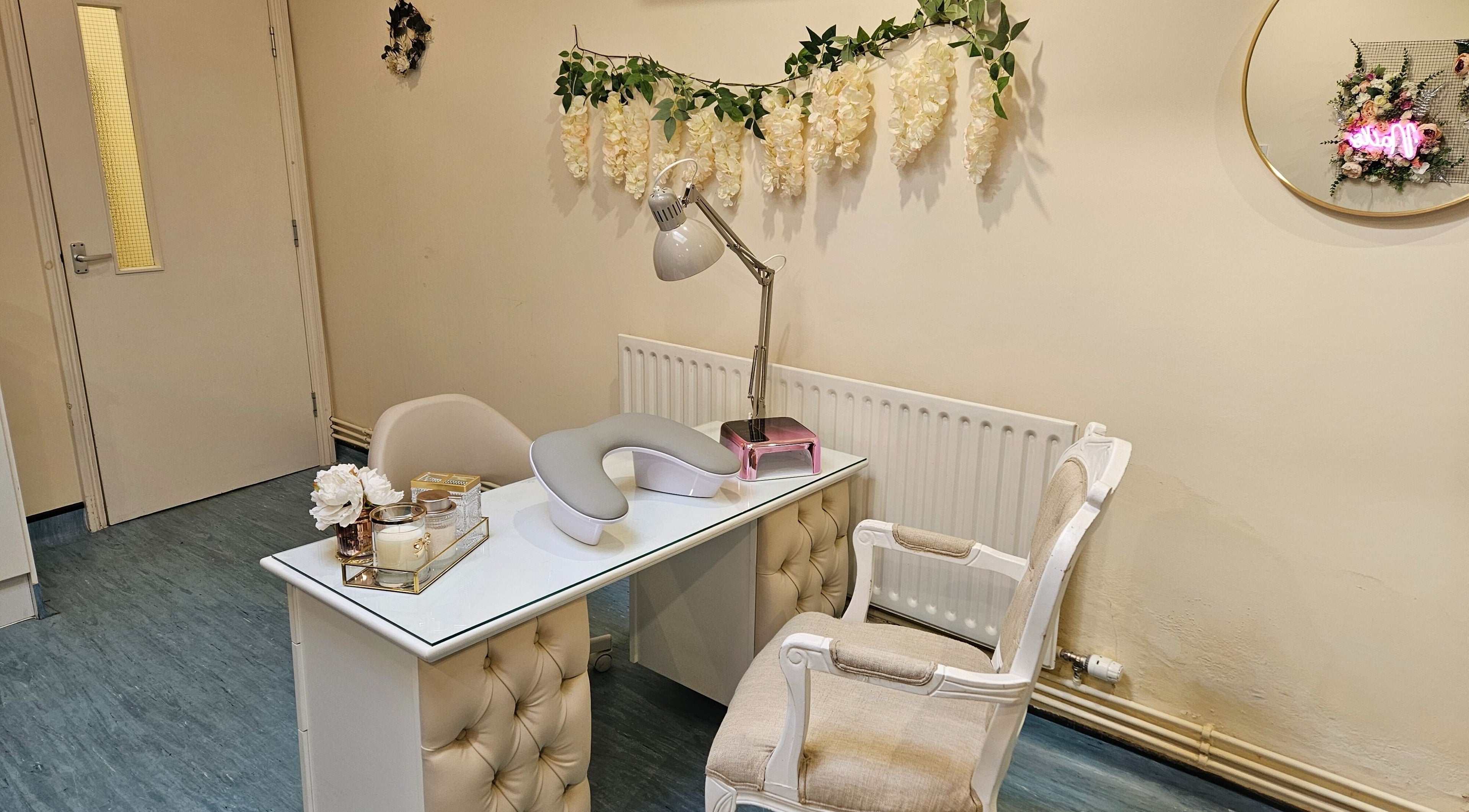Chic nail station at Eden Beauty Lounge, Kirton, England, GB adorned with elegant decor and lighting.