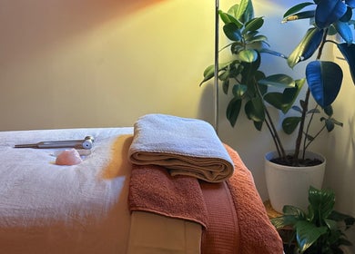 Tranquil massage room at Sound and Bodywork Massage, Melbourne, Victoria, AU, with cozy linens and calming decor.