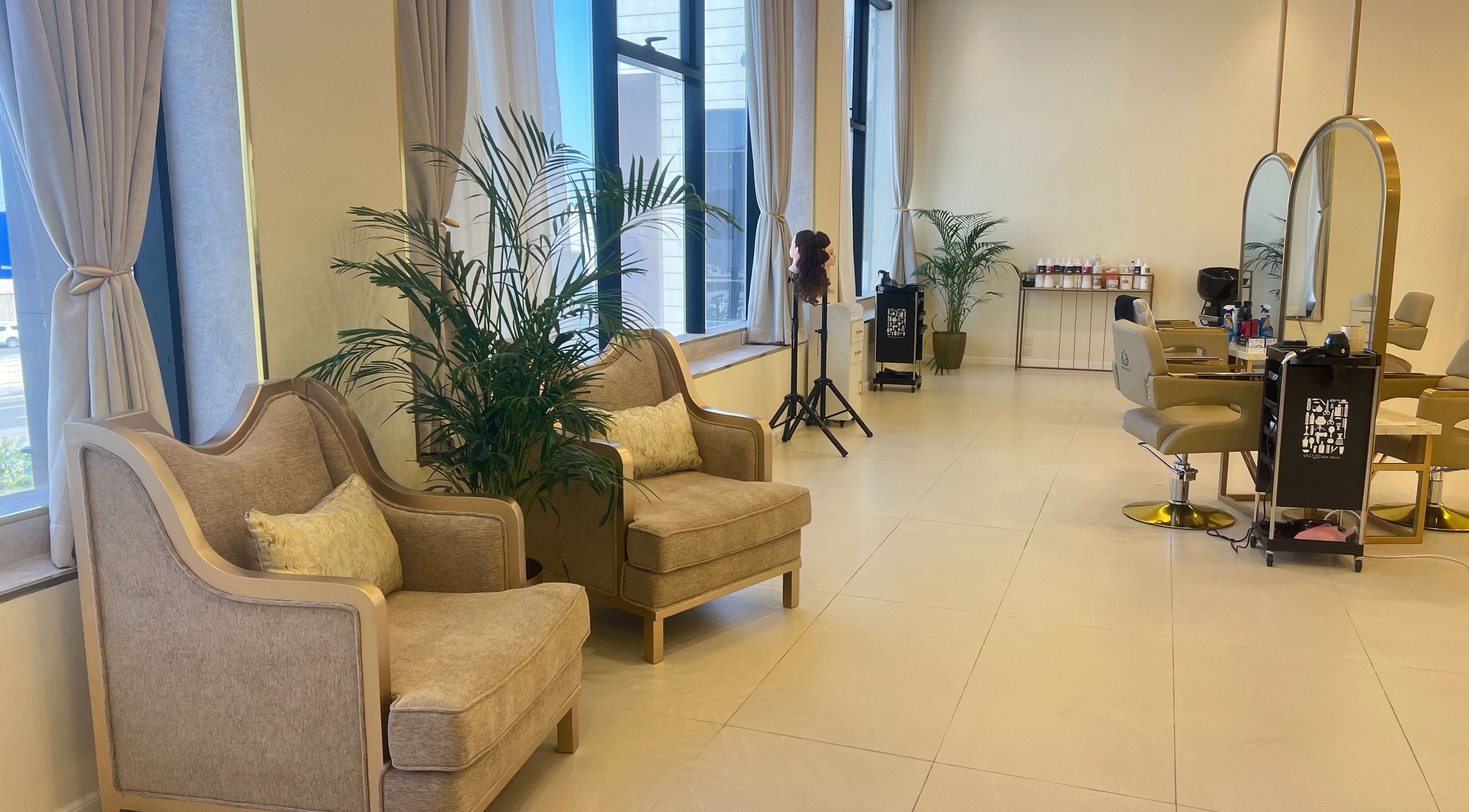 Stylish interior of Hermosa Beauty Salon in Dhahran, Eastern Province, SA with elegant chairs and mirrors.