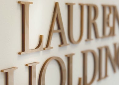 Close-up of elegant signage at Lauren Brows and Beauty, Dubai, Dubai, AE, featuring stylish lettering.