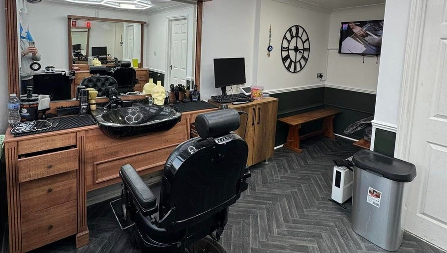Gents & Co. Barbershop interior in Clacton-on-Sea, England featuring styling chairs and modern decor.