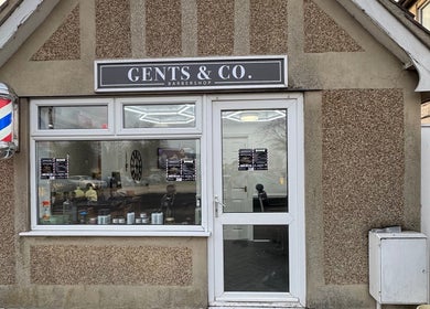 Front view of Gents & Co. Barbershop in Clacton-on-sea, England, featuring a classic barber pole.