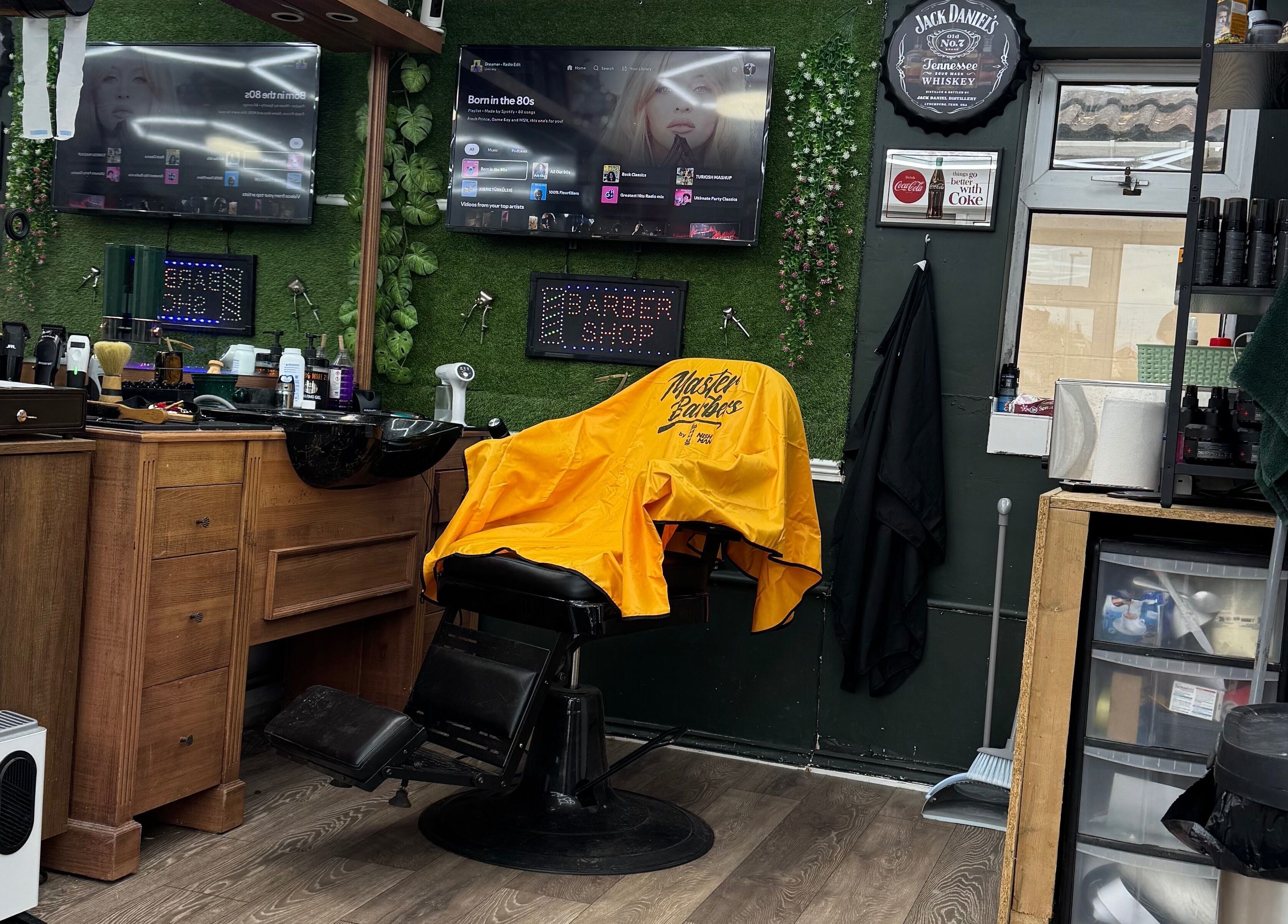 Chic barber chair at Gents & Co. Barbershop, Clacton-on-sea, England, GB. Modern decor and grooming tools visible.
