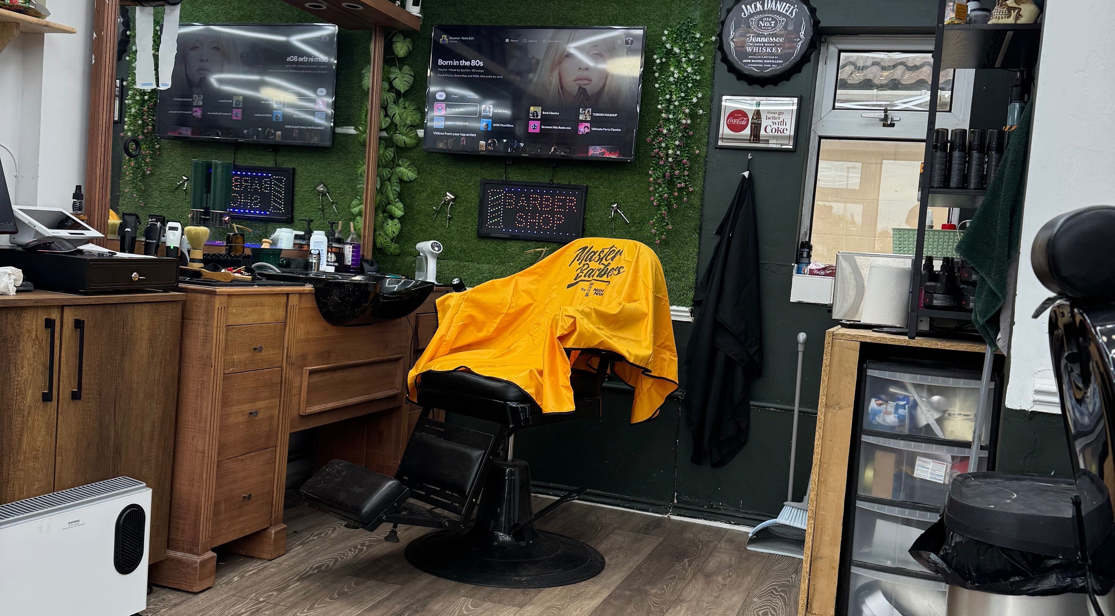 Chic barber chair at Gents & Co. Barbershop, Clacton-on-sea, England, GB. Modern decor and grooming tools visible.