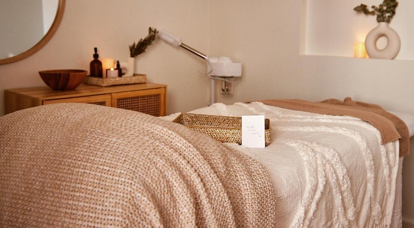 Tranquil treatment room at Oceá Eco Spa, Darwin City, NT, AU with cozy decor and soothing ambiance.