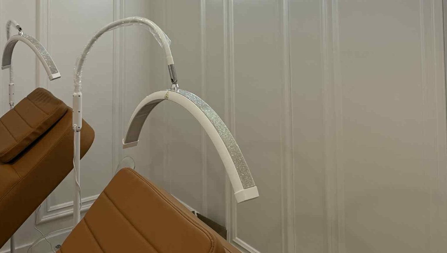 Elegant treatment chairs at Mikado Aesthetics, Toronto, Ontario, CA, offer a serene spa experience.