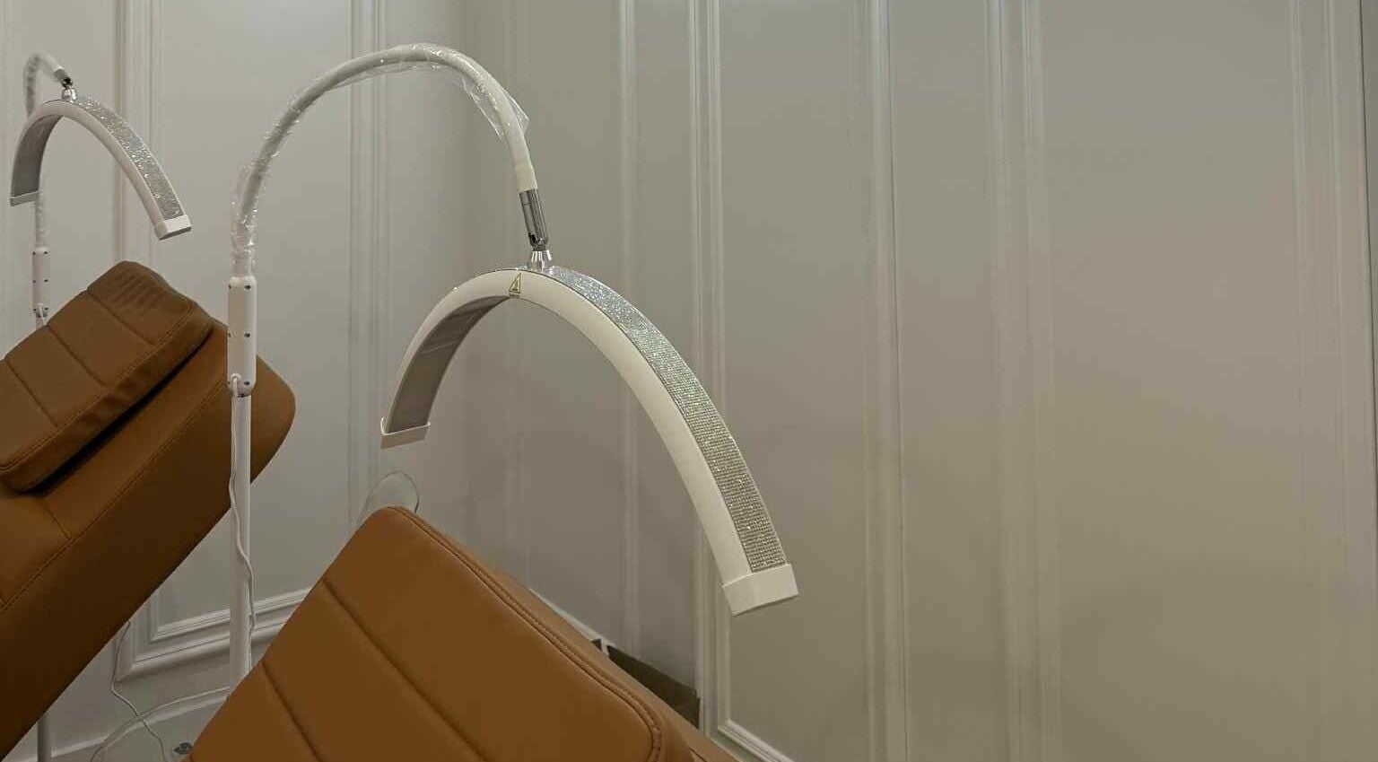 Elegant treatment chairs at Mikado Aesthetics, Toronto, Ontario, CA, offer a serene spa experience.