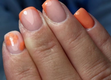 Bright orange nails design at Beauty By Eliza Grace, Broseley, England, GB. Perfect for a refreshing look.