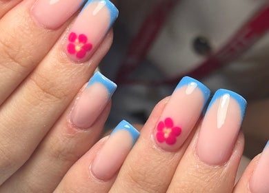 Blue French manicure with pink floral design by Beauty By Eliza Grace, Broseley, England, GB.