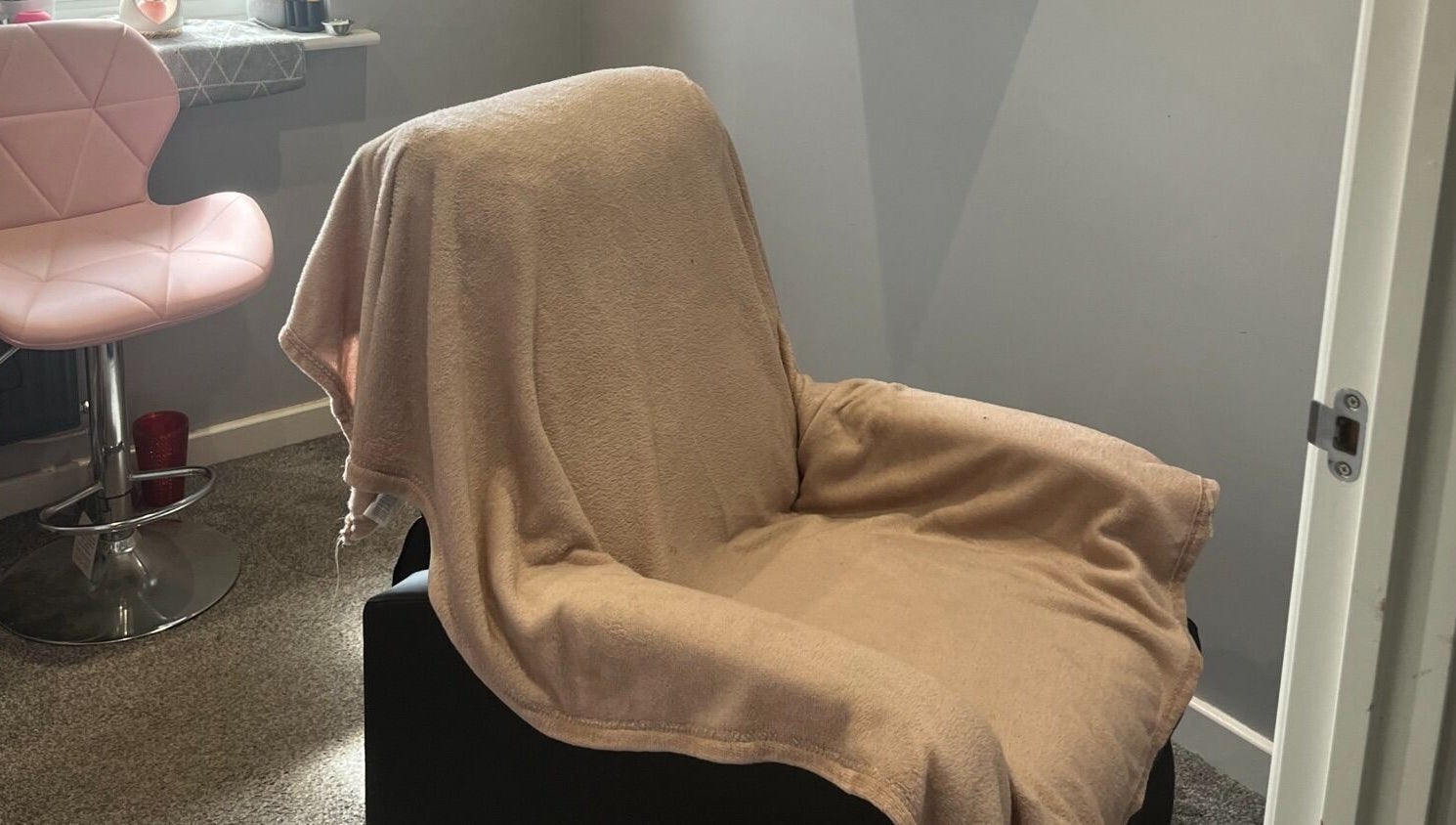 Comfortable chair covered in a soft blanket at Eyelife - Lashes Oldham, Oldham, England, GB.