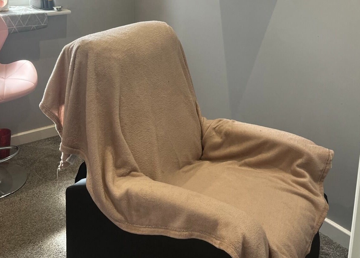 Comfortable chair covered in a soft blanket at Eyelife - Lashes Oldham, Oldham, England, GB.
