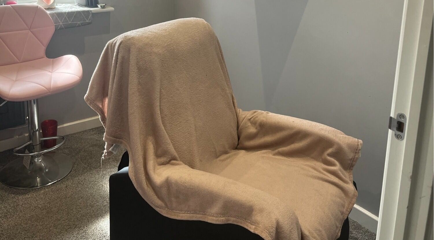 Comfortable chair covered in a soft blanket at Eyelife - Lashes Oldham, Oldham, England, GB.