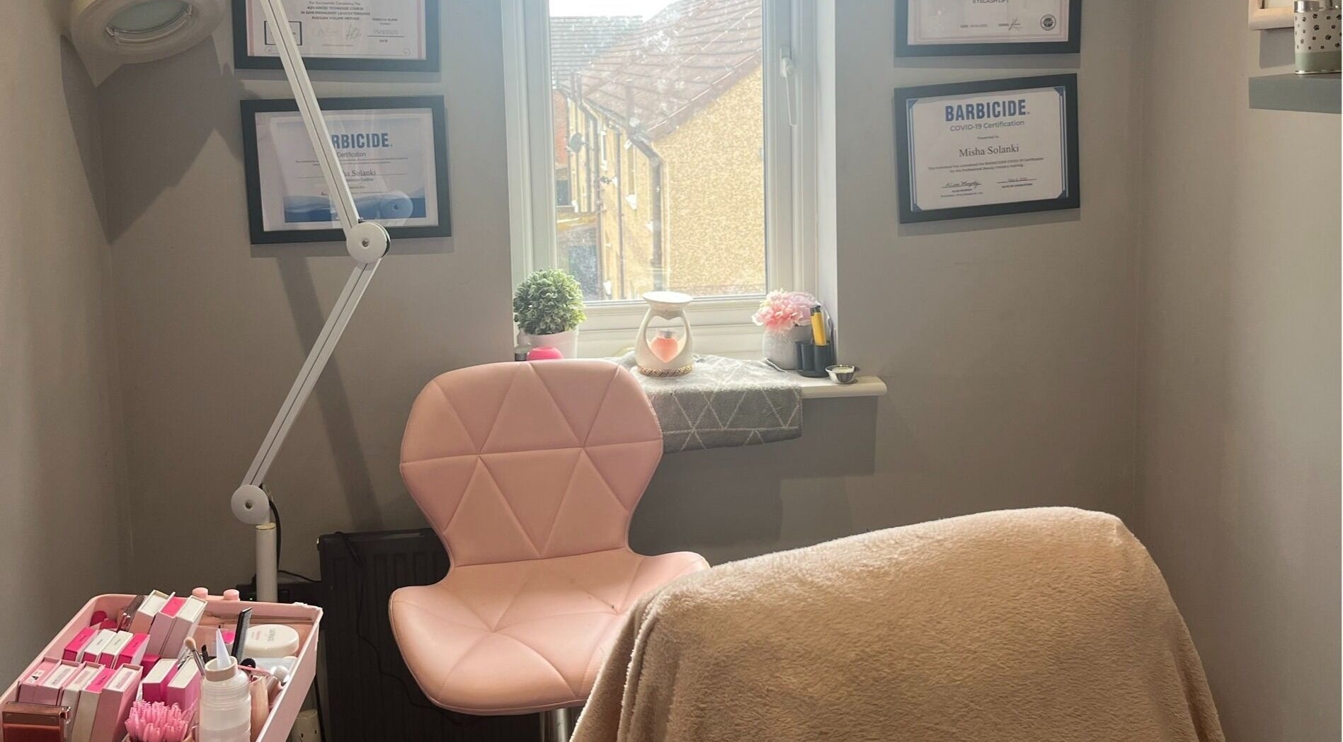 Eyelife - Lashes Oldham's tranquil treatment room in Oldham, England, GB with pink chair and decor.