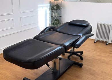 Luxury modern treatment chair in Relax & Glow, Swindon, England, GB, offering ultimate relaxation.