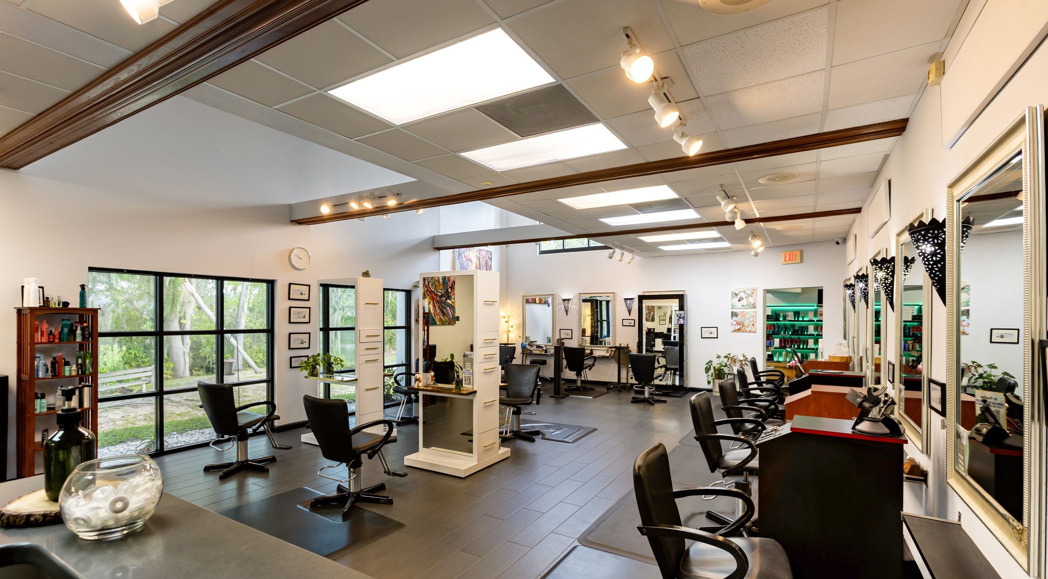Modern interior of Venue Salon in Lakeland, Florida, US, showcasing spacious, well-lit styling stations.
