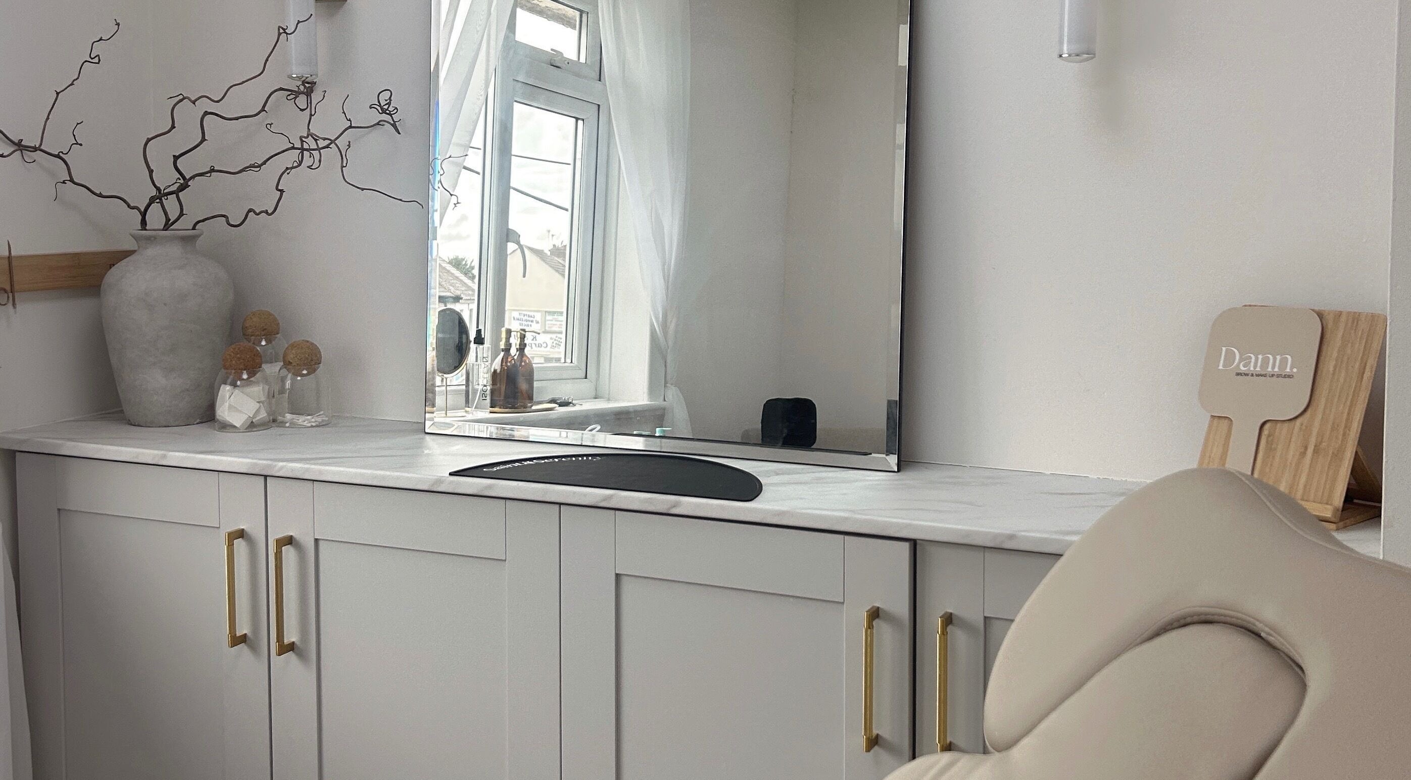 Sophisticated vanity at Callierobinsonbrows AT DANN STUDIO, Plymouth, England, GB with modern decor.