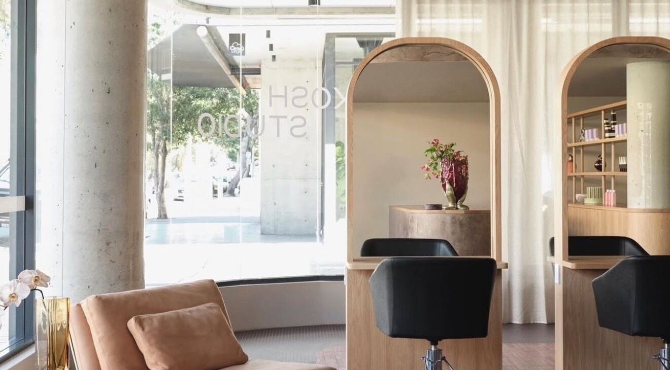 Elegant interior of Hair by Montana in Bondi, New South Wales, AU with modern salon chairs and stylish decor.