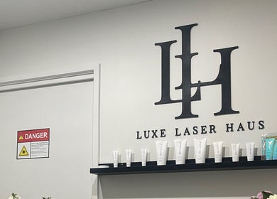 Luxe Laser Haus interior featuring skincare products on a shelf. Located in Carnegie, Victoria, AU.