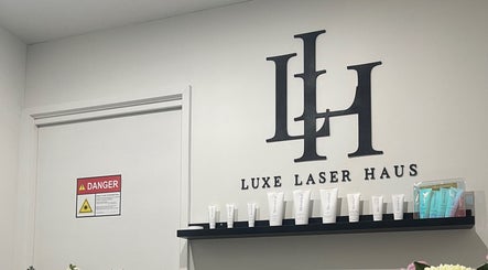 Luxe Laser Haus interior featuring skincare products on a shelf. Located in Carnegie, Victoria, AU.