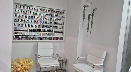 Elegant nail polish display and seating at NuNails Cape Town, Western Cape, ZA.